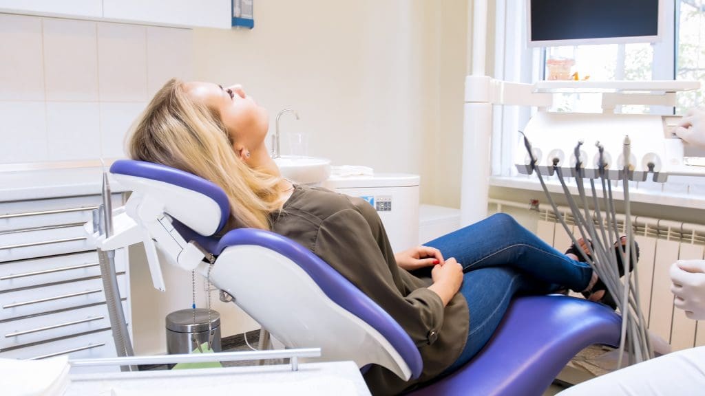young woman relaxed in a modern dental office